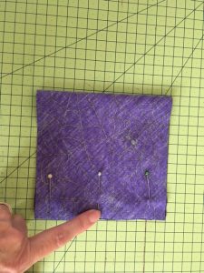 Sew the short edges together on the wrong side.