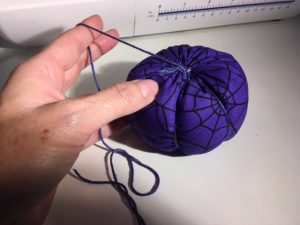 Create the pumpkin segments using embroidery thread.